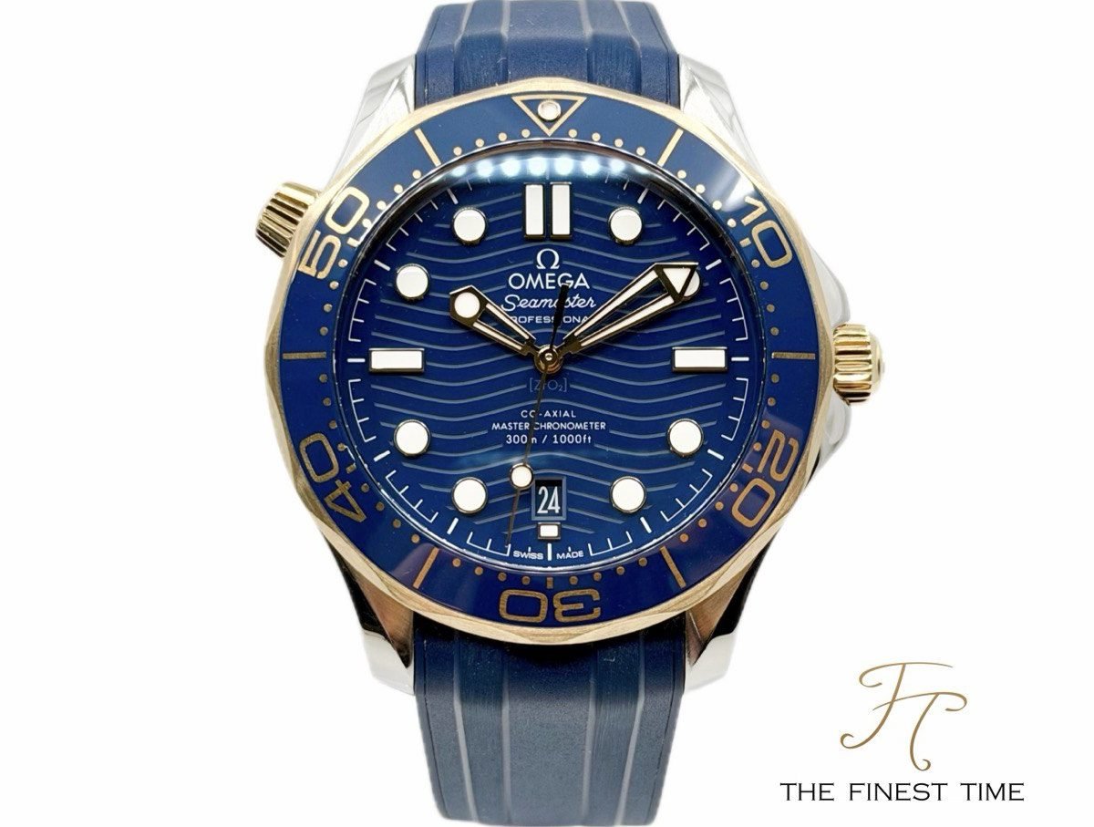 Omega Seamaster Diver 300M 210.22.42.20.03.001 Blue Yellow Gold Rubber Strap